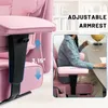 Close-up of a pink office chair armrest with a measurement indicator, and a smaller inset image of a person sitting at a desk using a similar chair. Podgląd zdjęcia produktu
