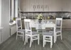 A dining set with chairs and a table in a kitchen. Produktbild-Vorschau