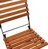Close-up view of a wooden slatted chair. Produktbild-Vorschau