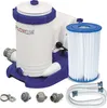 A white and blue swimming pool filter pump with a filter cartridge and hoses, displayed on a white background. Voir les images du produit