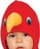 A close-up of a child wearing a red parrot costume hood. Anteprima dell’immagine prodotto