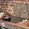 Plaques de recouvrement pour cuisinière 2 pièces 30x52 Voir les images du produit 3