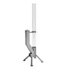 A stainless steel fire tube heater with a clear glass cylinder, standing on a tripod base against a white background. Produktbild-Vorschau