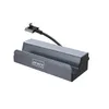 A gray and black USB-C hub adapter for a gaming console, shown from a diagonal angle on a white background. Produktbild-Vorschau