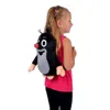 A young girl wearing a plush mole backpack. Produktbild-Vorschau