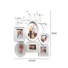 A white multi-photo frame collage with the word 'FAMILY' at the top, displaying several family photos within different shaped frames. Produktbild-Vorschau