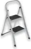 A silver two-step folding stepladder with black treads, shown against a white background. Anteprima dell’immagine prodotto