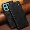 A black leather phone case is shown on a brown textured surface. Produktbild-Vorschau