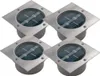 Four square solar-powered ground lights are arranged in a grid formation against a white background. Produktbild-Vorschau