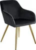 A black velvet dining chair with gold legs is shown against a white background.