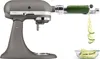 A KitchenAid stand mixer with a spiralizer attachment is shown, spiraling a zucchini into a bowl. Produktbild-Vorschau