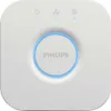 A top-down view of a white Philips Hue bridge on a white background. Produktbild-Vorschau