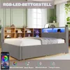 A modern bedroom with a grey upholstered bed frame featuring a built-in bookshelf headboard with LED lighting. Náhled obrázku produktu