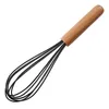 A kitchen whisk with a wooden handle and black silicone wires. Produktbild-Vorschau