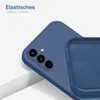 A close-up view of a blue silicone phone case, showing the camera cutout and the interior texture. Produktbild-Vorschau