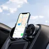 A smartphone is mounted on a car's air vent using a gravity phone holder, displaying a navigation map. Náhled obrázku produktu