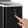 A close-up of a person's finger pressing a button on a black ice maker. Náhled obrázku produktu