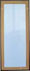 A vertical mirror with a black frame and a brown backing is shown against a light gray background. The mirror reflects a light blue sky. Produktbild-Vorschau