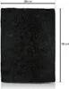A black filter mat with dimensions indicated by text and lines. Produktbild-Vorschau