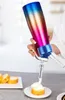 A person is using a whipped cream dispenser to decorate a small piece of bread with whipped cream. There are also slices of bread on a plate in the background. Produktbild-Vorschau