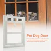 A white pet door is shown in the foreground, with several bulldogs looking through a window in the background. Náhled obrázku produktu