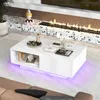 A modern living room with a coffee table in front of a fireplace. Voir les images du produit