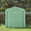 A green bicycle garage tent is set up on a lawn in front of a white picket fence and some trees. Produktbild-Vorschau