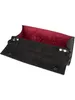 An open black clutch bag with a red interior, shown from a slightly elevated angle. Produktbild-Vorschau
