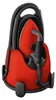 A red and black steam generator iron is shown standing upright in its base. Produktbild-Vorschau