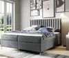 A bedroom scene with a bed, window, and artwork on the wall. Anteprima dell’immagine prodotto