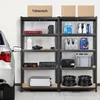 A garage or storage area with shelving units filled with various items, next to a car. Produktbild-Vorschau