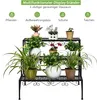 A multi-tiered metal plant stand filled with various potted plants, displayed against a white background with illustrative icons and text above. Produktbild-Vorschau