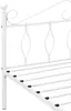 Close-up of the headboard and frame of a white metal bed. Podgląd zdjęcia produktu