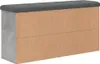 A shoe bench with a gray upholstered top and a wood-like body with a concrete-look side. Anteprima dell’immagine prodotto