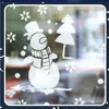 A festive window decoration featuring a snowman and a Christmas tree, likely created with spray paint. Produktbild-Vorschau