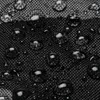 A close-up of water droplets on a black fabric surface. Náhled obrázku produktu