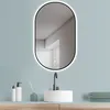 A bathroom vanity with a sink, faucet, and mirror. Produktbild-Vorschau