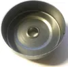 A metal cup with a central hole. Náhľad obrázku produktu