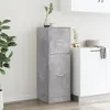 A concrete gray cabinet with two drawers is placed in a kitchen setting next to a white cabinet. Produktbild-Vorschau