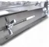A close-up shot of a metal attachment with a wingnut and a slotted opening. Produktbild-Vorschau