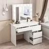 A white vanity table with a lighted mirror and drawers, filled with makeup, is shown in a room with a window and curtains. Podgląd zdjęcia produktu