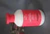 A bottle of Wella Professionals Invigo Color Brilliance shampoo is shown lying on its side against a gray background. Produktbild-Vorschau