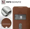 Close-up view of a brown leather flip phone case with card slots and RFID protection. Produktbild-Vorschau