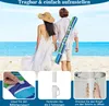 A couple walking on a beach with a beach umbrella. Náhled obrázku produktu