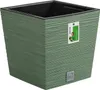 A green square planter pot with a textured surface, shown on a white background. A product tag is attached to the side. Produktbild-Vorschau