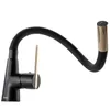 A black kitchen faucet with a flexible neck and gold accents, isolated on a white background. Produktbild-Vorschau