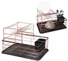 Two copper dish racks with black trays and utensil holders, shown from different angles. Anteprima dell’immagine prodotto
