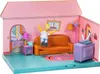 A toy playset depicting the living room of The Simpsons' house, with a Homer Simpson figure. Podgląd zdjęcia produktu