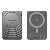 Two views of a dark gray portable power bank, one showing the textured back and the other showing the front with a magnetic charging ring. Náhled obrázku produktu