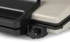 Close-up of a grill with a dial control. Podgląd zdjęcia produktu